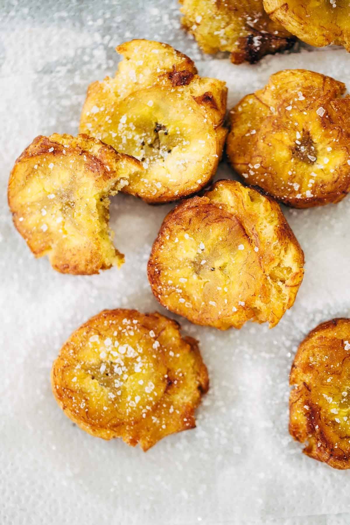 Spicy Brazilian Burrito Bowls recipe featuring seasoned rice and beans, garlic cilantro lime slaw, and crispy fried plantains. So good // almost vegan. | pinchofyum.com