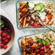 Meal prep on the counter of the buffalo chicken bowls.