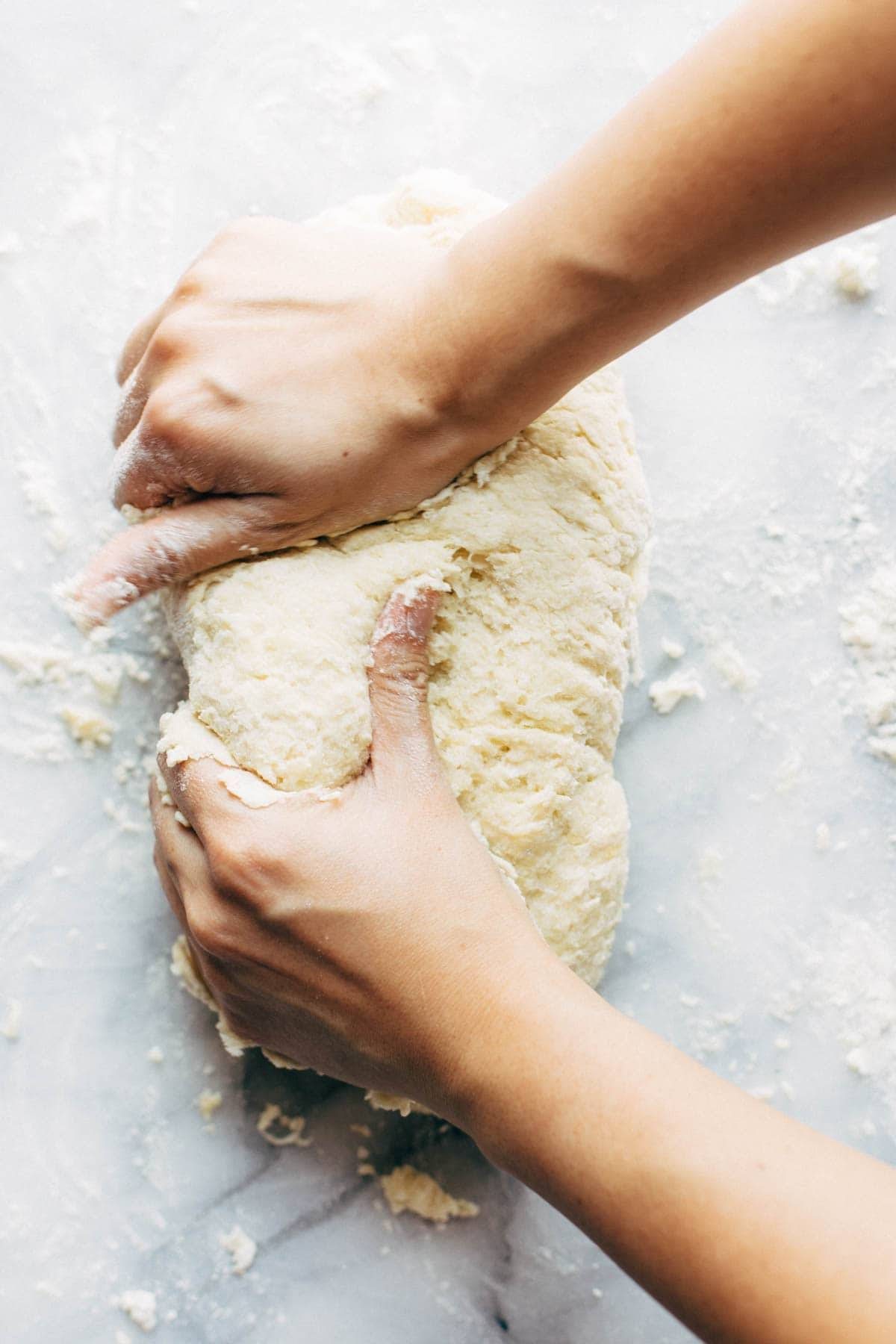 Forming gnocchi dough into a loaf.