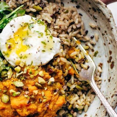 Healing Bowl with sweet potatoes, rice and arugula.