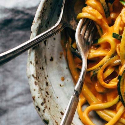 Roasted Red Pepper Pasta in a bowl with a fork.