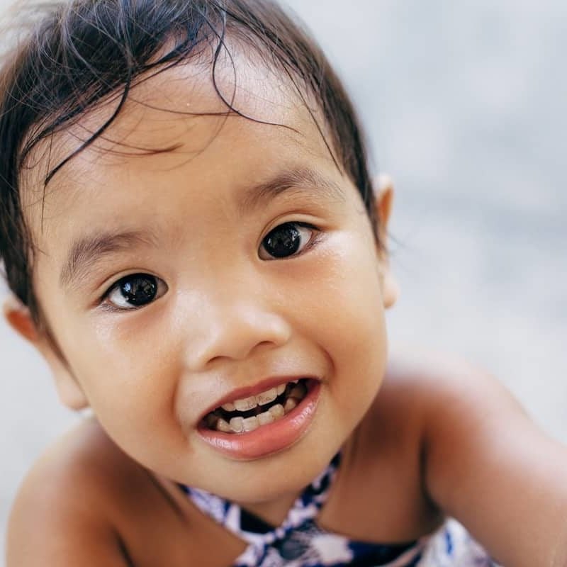 Young girl looking at camera.