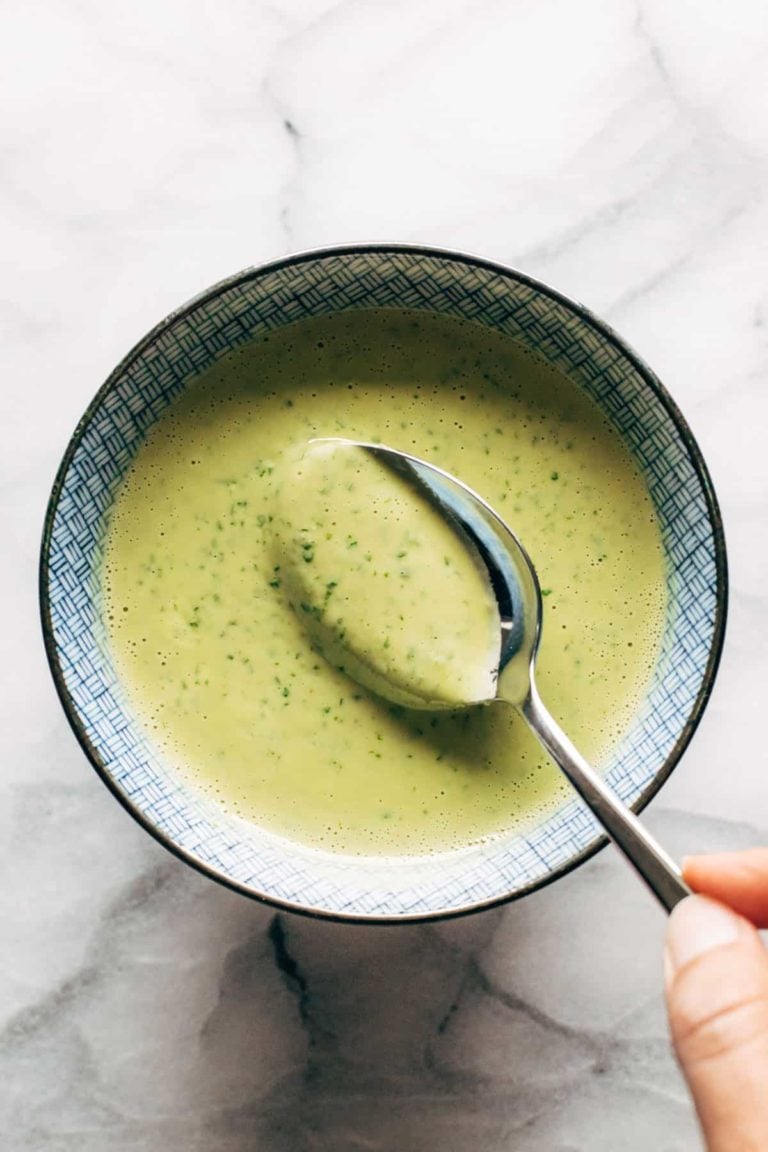 Green tahini in a bowl.