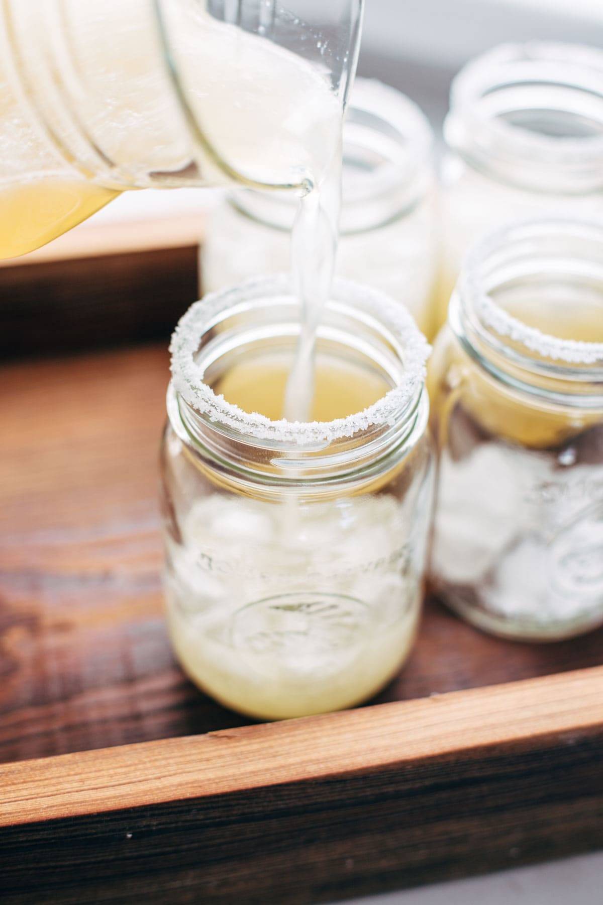 Pitcher Margaritas for a Crowd - all you need is simple syrup, lime juice, and tequila. These make THE BEST party drinks! | pinchofyum.com