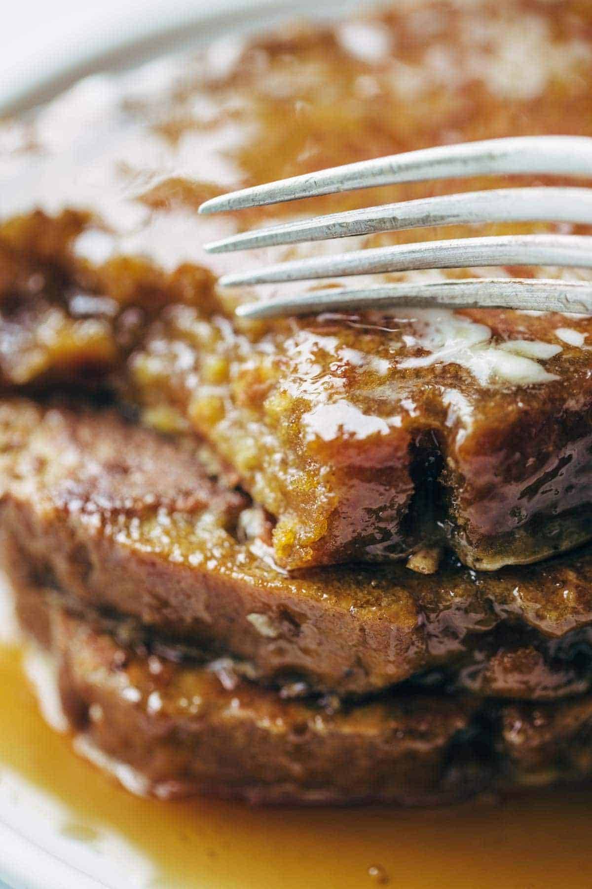 Pumpkin Bread French Toast - easy recipe with eggs, milk, vanilla, and a few pieces of pumpkin bread. Golden brown, sticky sweet brunch perfection. | pinchofyum.com